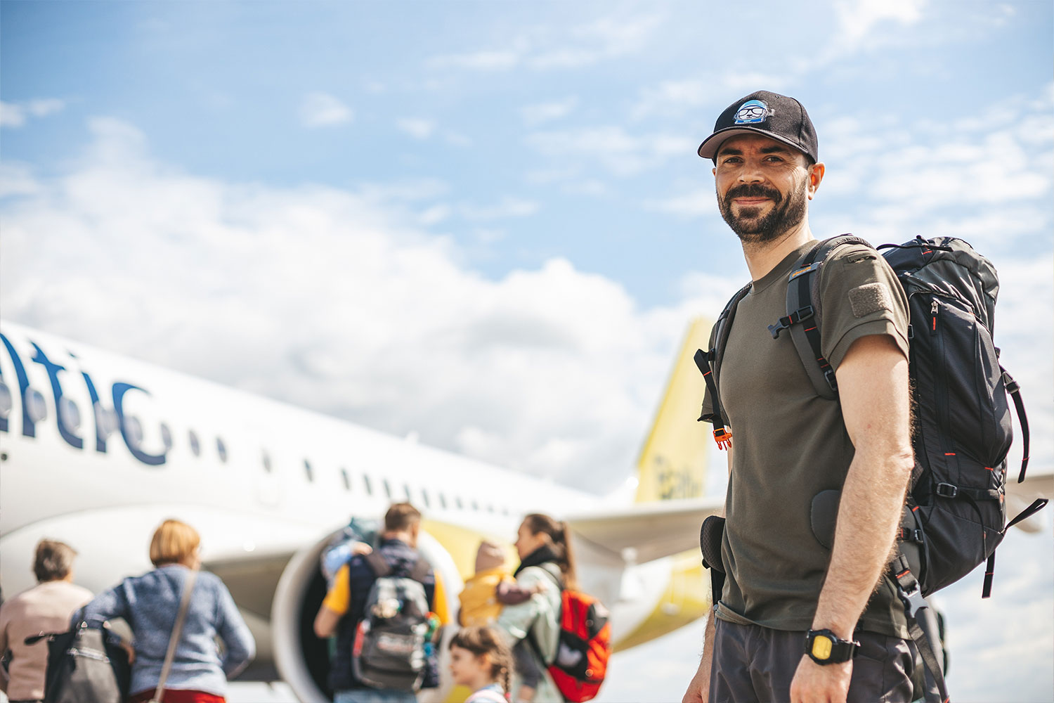 Smiling Tourist Prepared For A Flight S5EBYE3